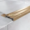 Порог угловой для защиты ступеней из нержавеющей стали шириной 35 мм  FCGF 15 золото сатинированное 2,7 м (Kepler Profiles)